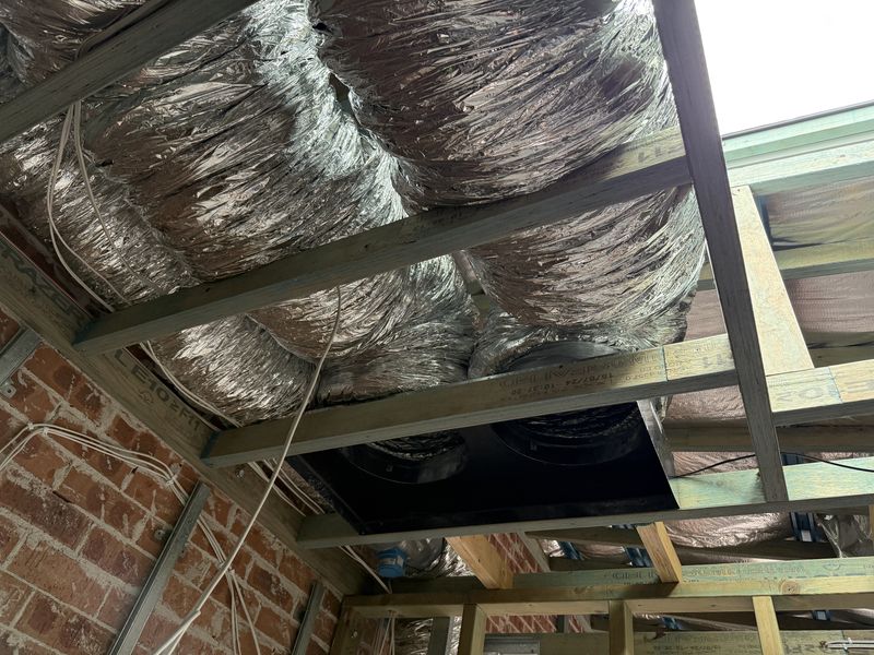 Rough-in: return air plenum and insulated flexible ductwork installed in the ceiling space, Botany, NSW