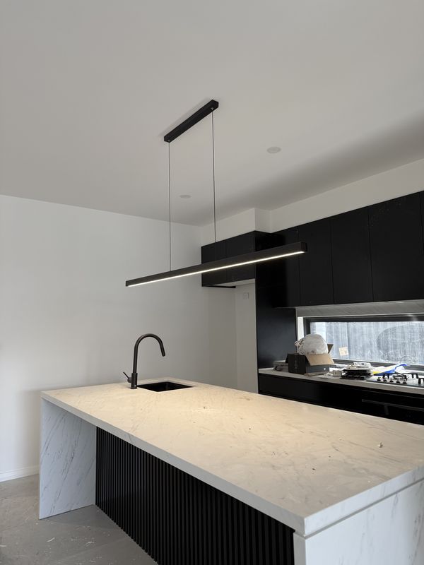 Linear LED pendant light over the kitchen island, Birrong, NSW